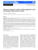 Influence of ultrasonic excitation and heat application on the microleakage of glass ionomer cements